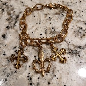 2/$29. Bracelet. 2 tone gold tone Old World style bracelet.